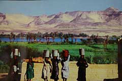 Nubian women buckets